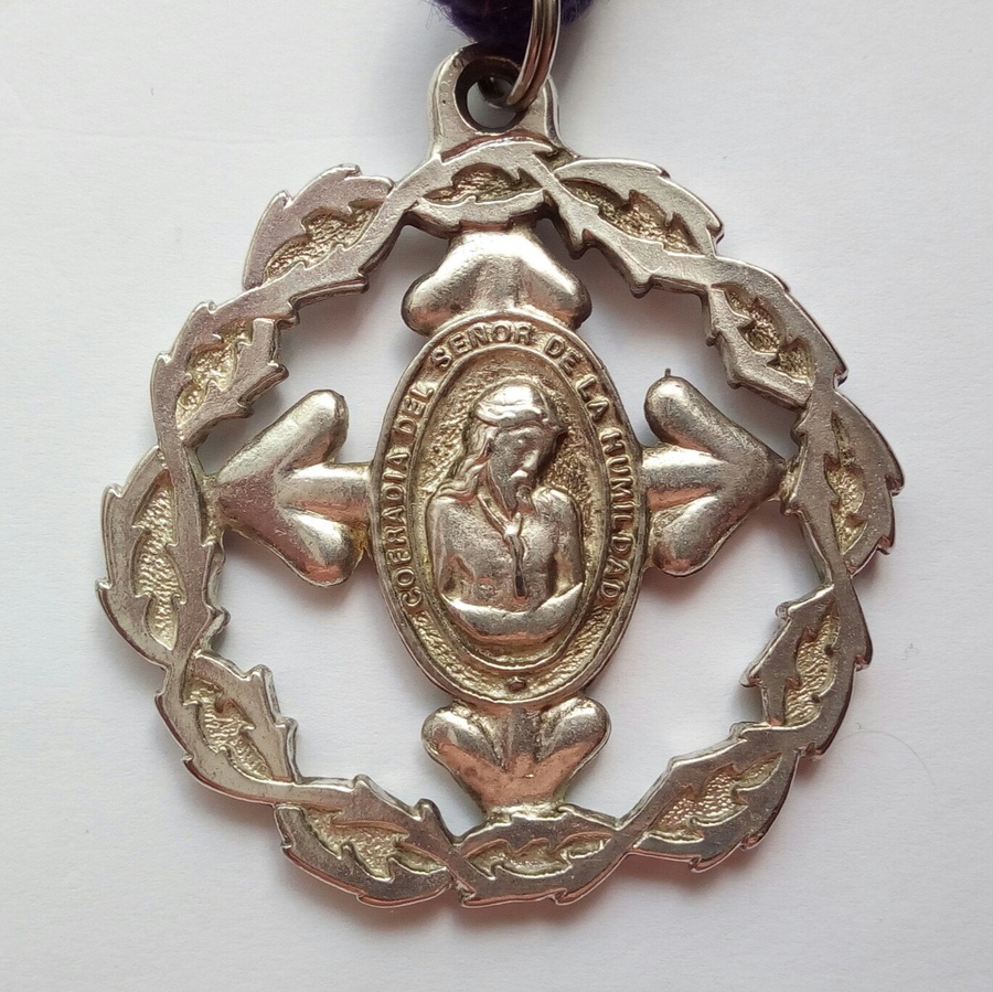 Medalla, reverso